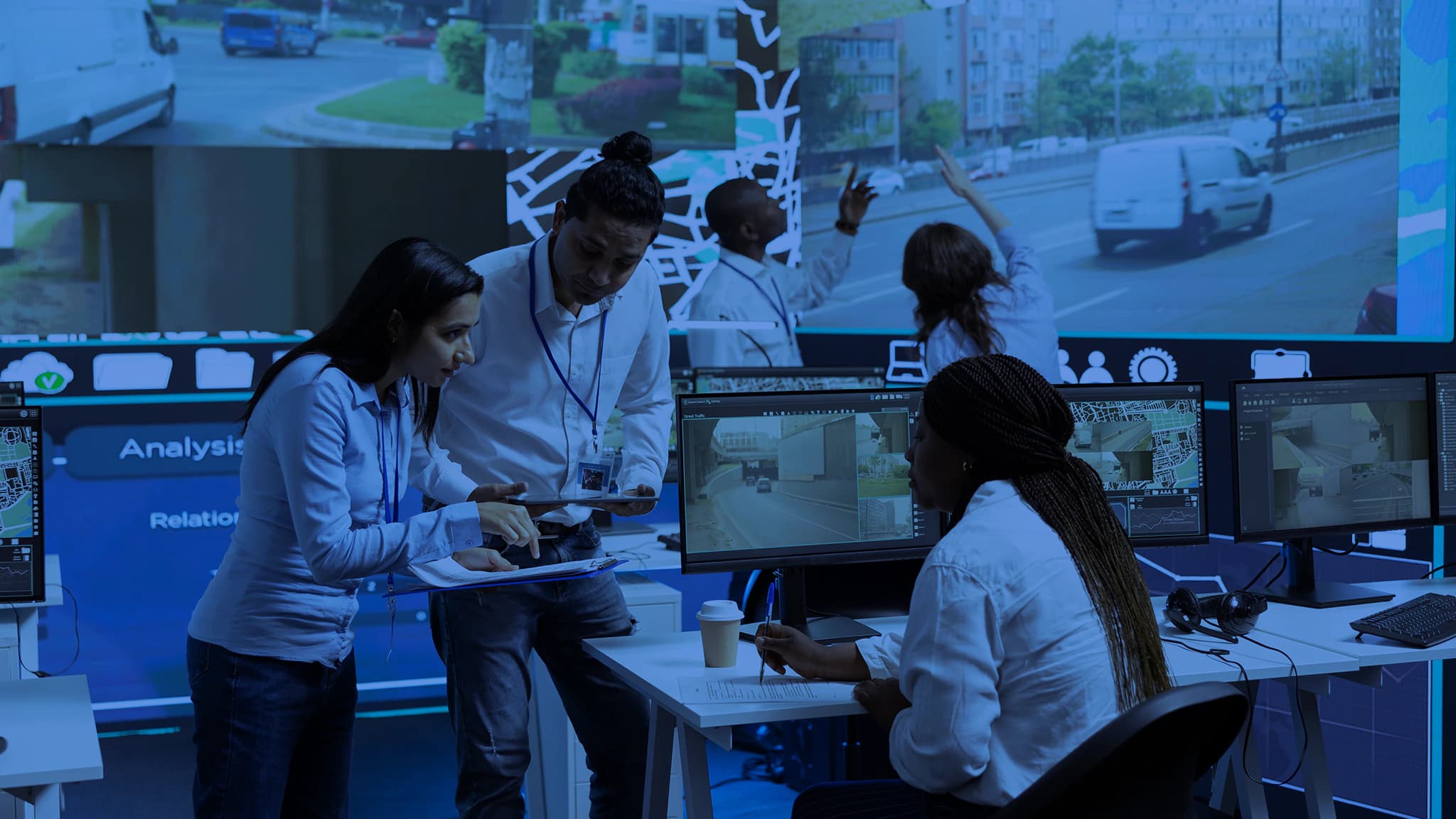 Professional using AI tools in a monitoring centre