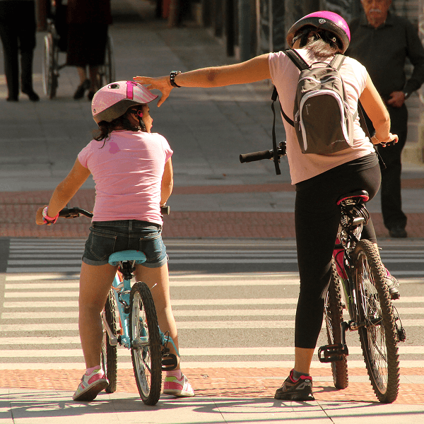 Cyclists at a city crosswalk